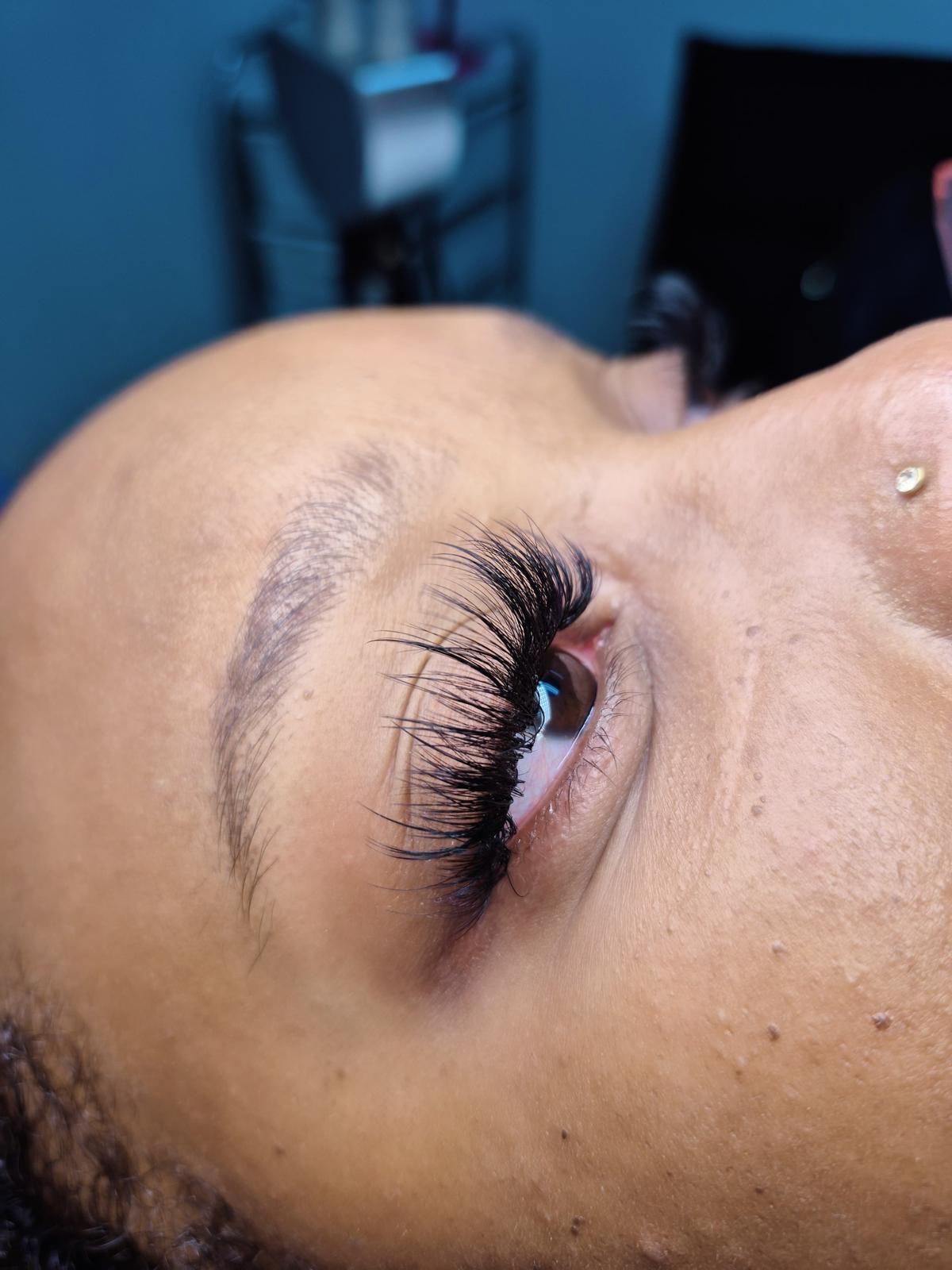 Wispy hybrid lash extensions side view